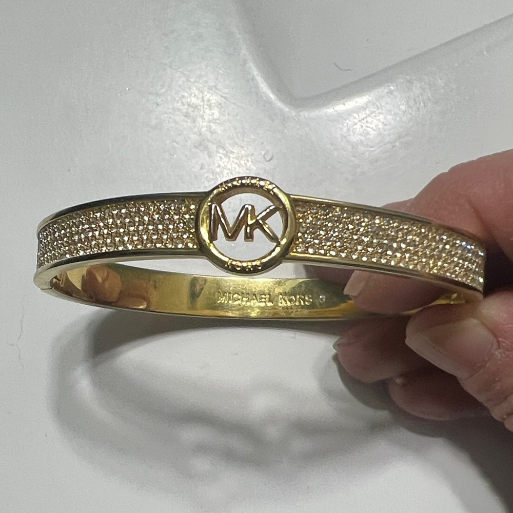 Michael Kors Gold-Tone Logo Clasp Bracelet Used with some light wear